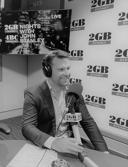 Man smiling in radio booth